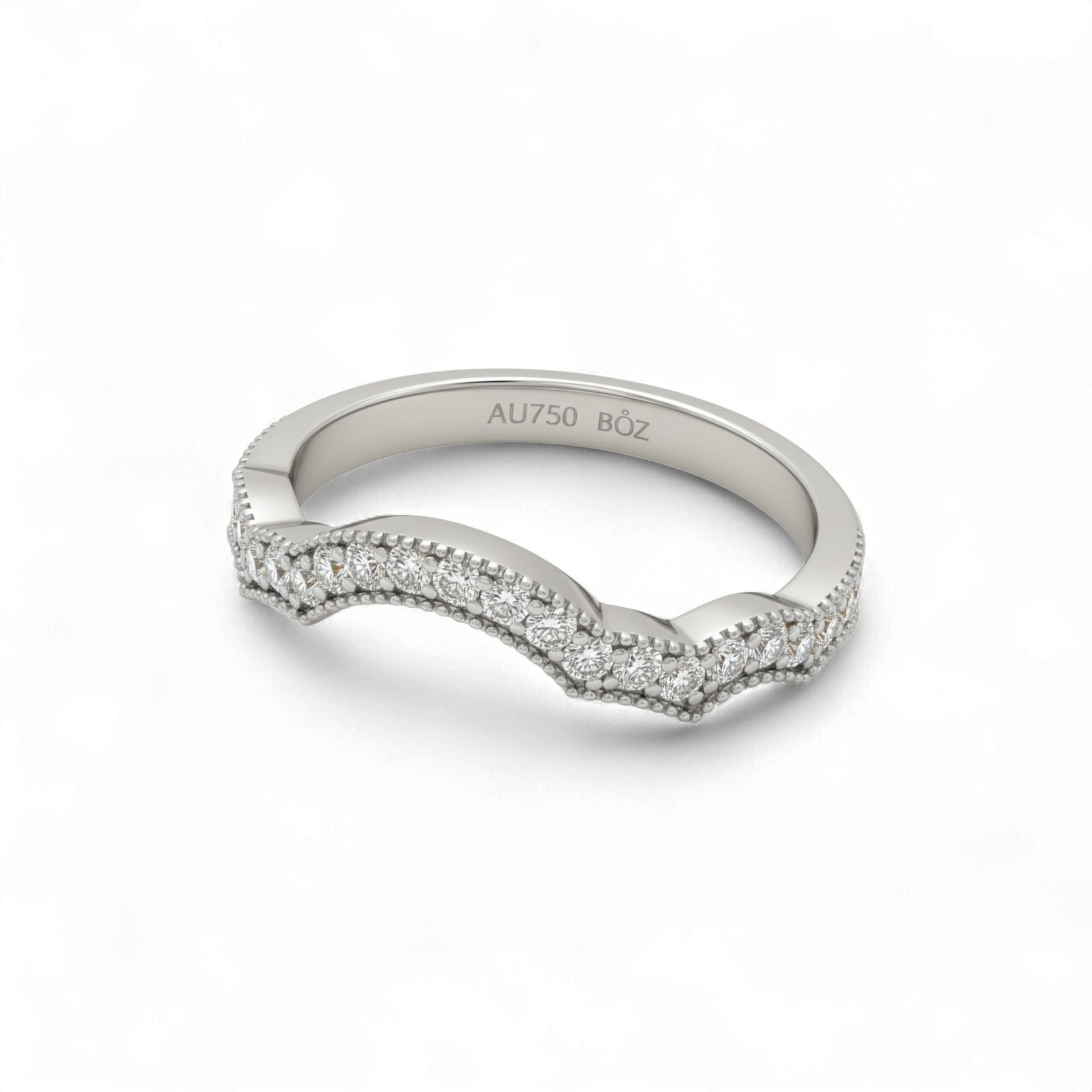 Silver ring with diamond accents on a white background