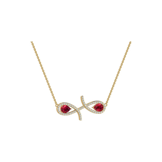 Gold necklace with a fish-shaped pendant featuring red stones on a white background