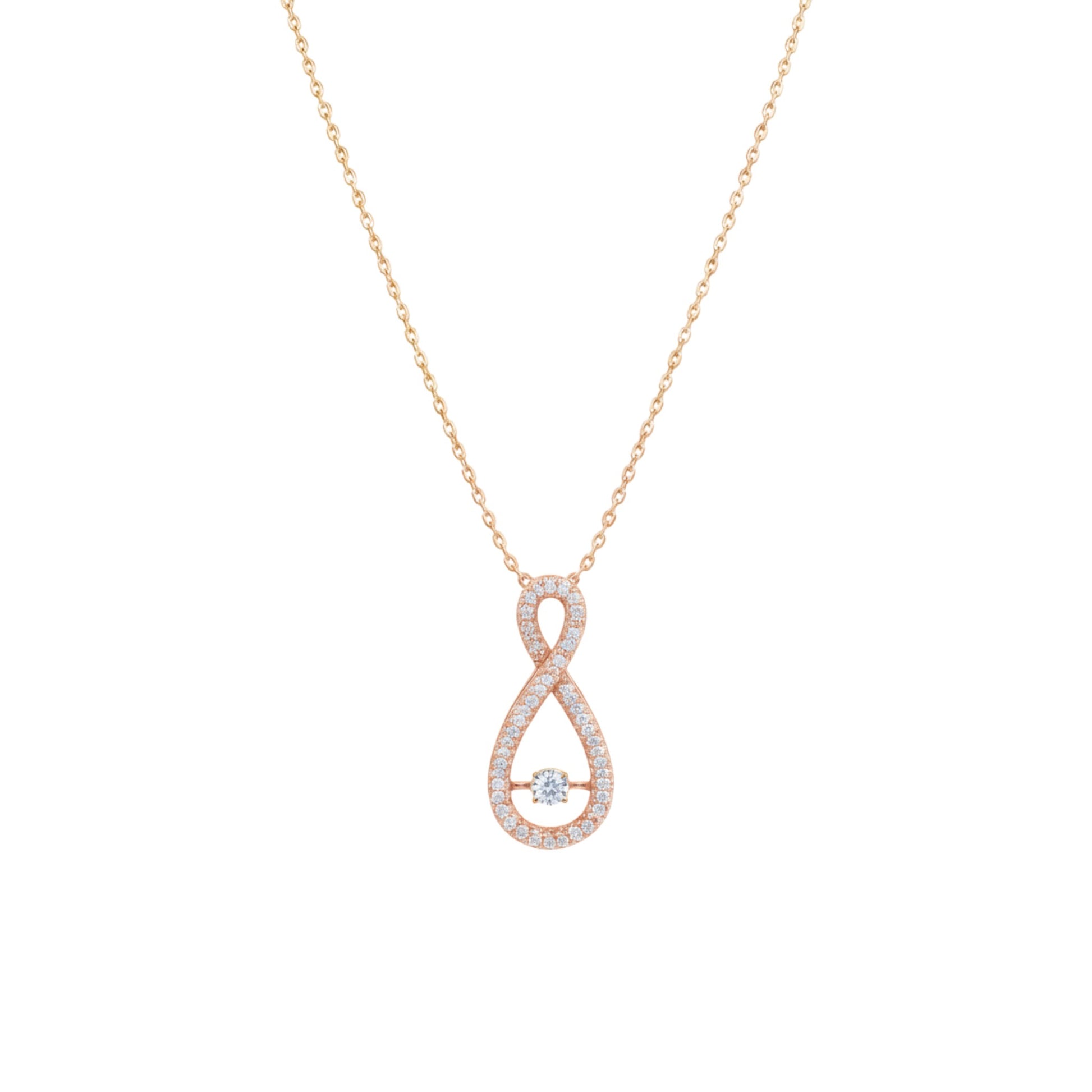Rose gold infinity necklace with a small diamond on a white background