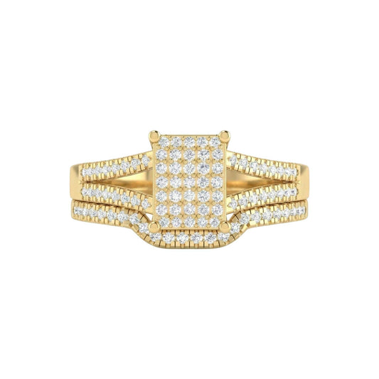 Gold ring with diamond accents on a white background