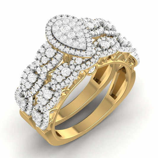 A gold ring featuring a pear cut diamond cluster, surrounded by smaller clear diamonds set in a band.