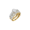 Gold ring with diamond accents on a white background