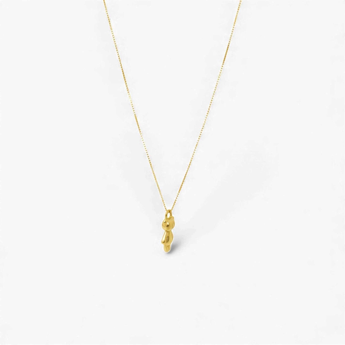 18KT gold teddy bear pendant necklace with fine detailing and smooth finish