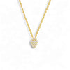 Gold necklace with a heart-shaped diamond pendant on a white background