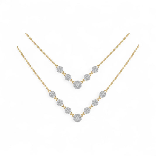 Gold necklace with diamond-like stones on a white background