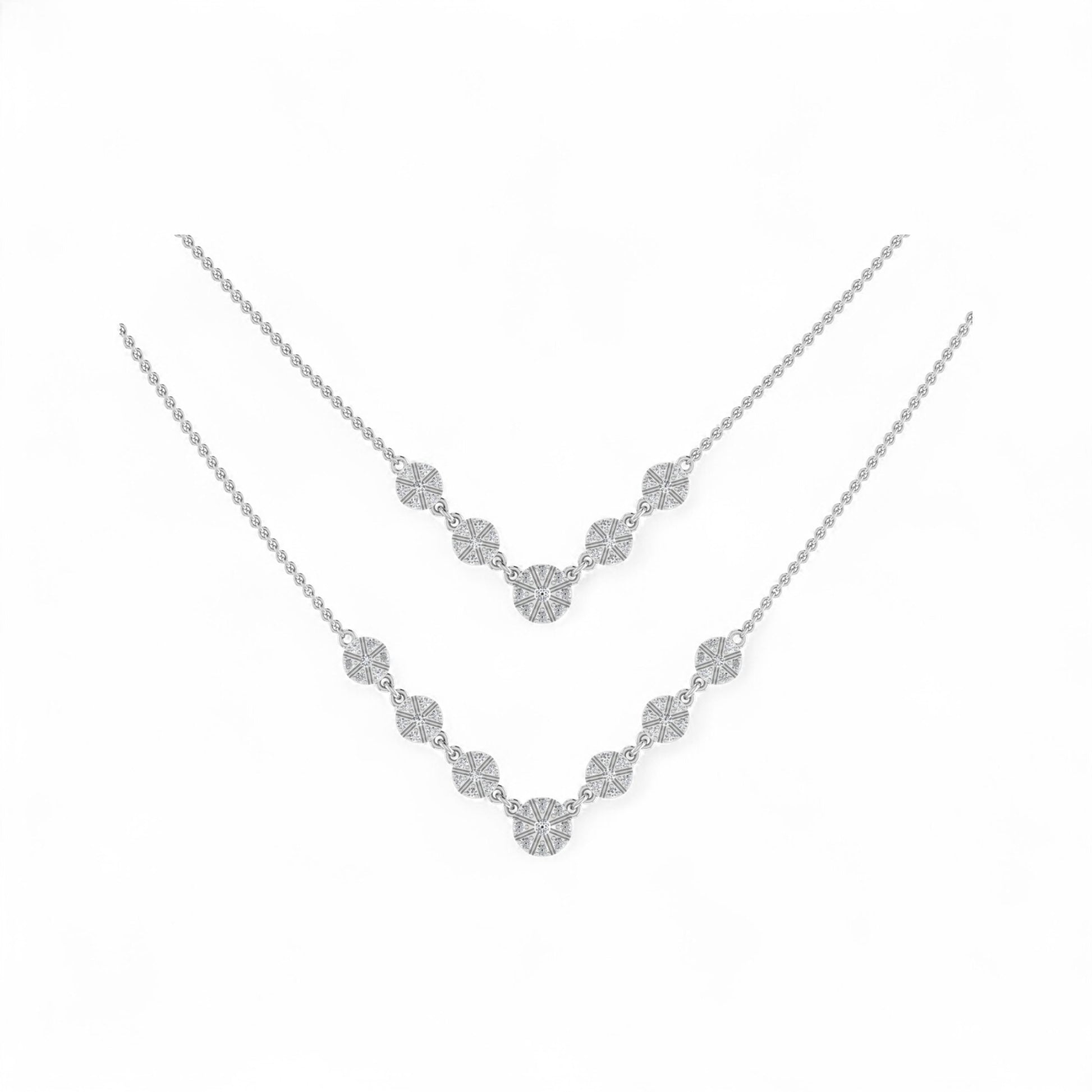 Silver necklace with floral design on a white background