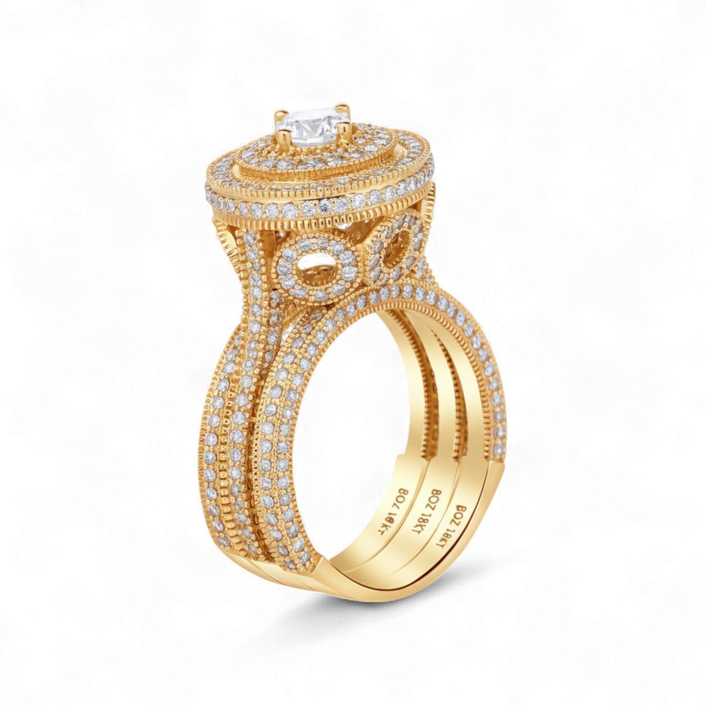 Gold ring with diamond accents on a white background