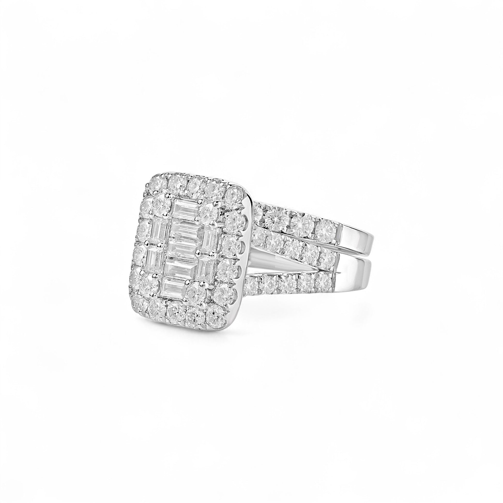 Diamond ring with emerald-cut center stone on a white background
