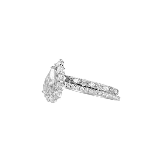 Diamond ring with a pear-shaped center stone on a white background