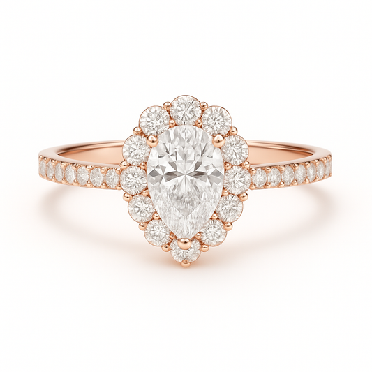 Rose gold ring with a pear-shaped diamond and smaller diamonds on a white background