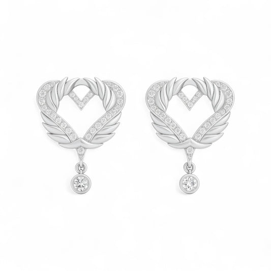 Pair of silver heart-shaped earrings with feather designs on a white background