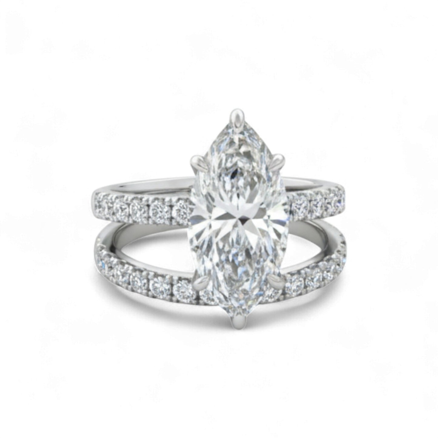 Diamond ring with pear-shaped center stone on a white background