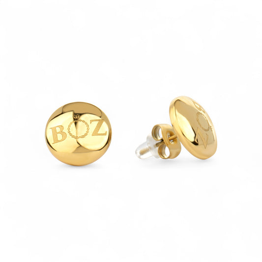 Gold earrings with 'BOZ' engraving on a white background