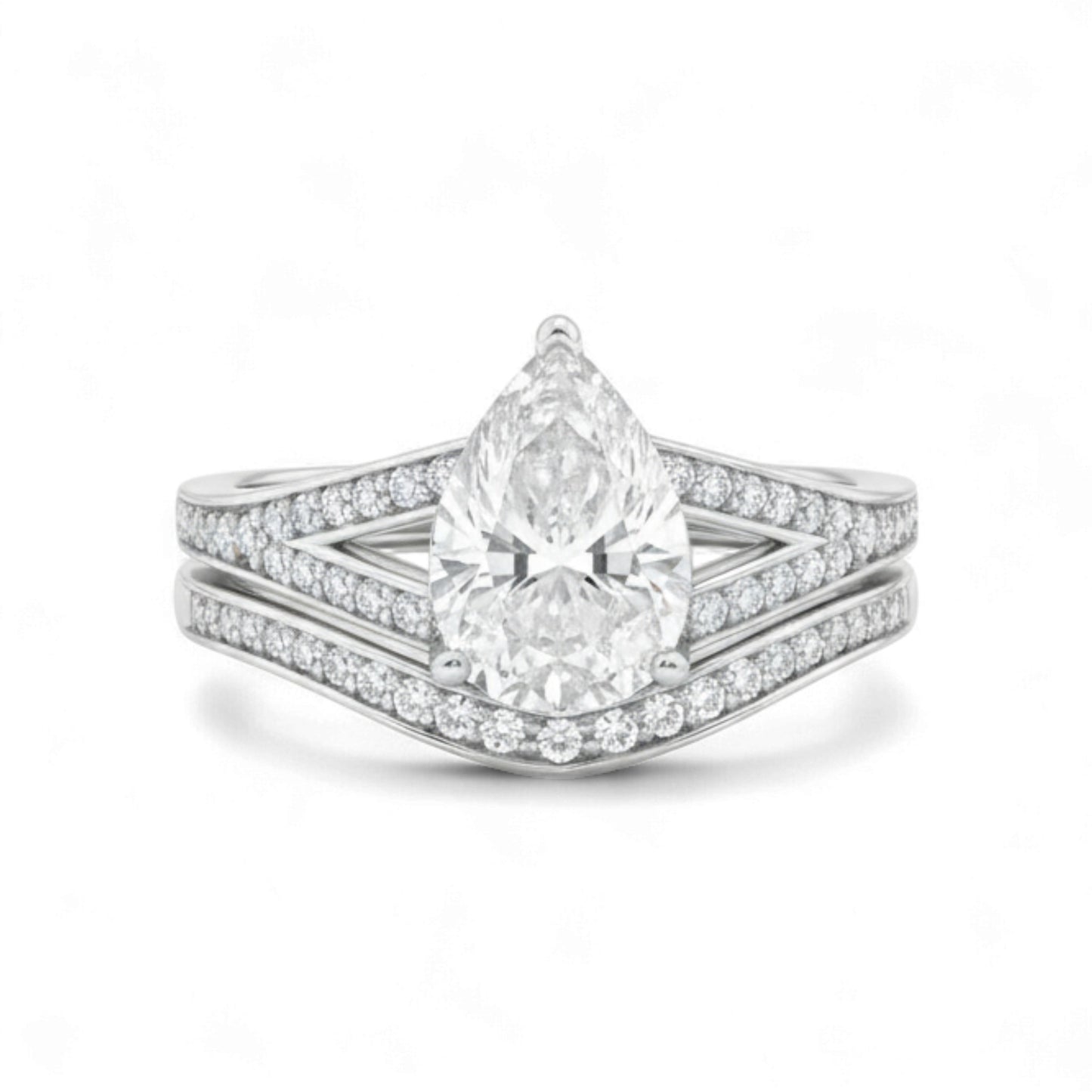 Diamond ring with a pear-shaped center stone on a white background