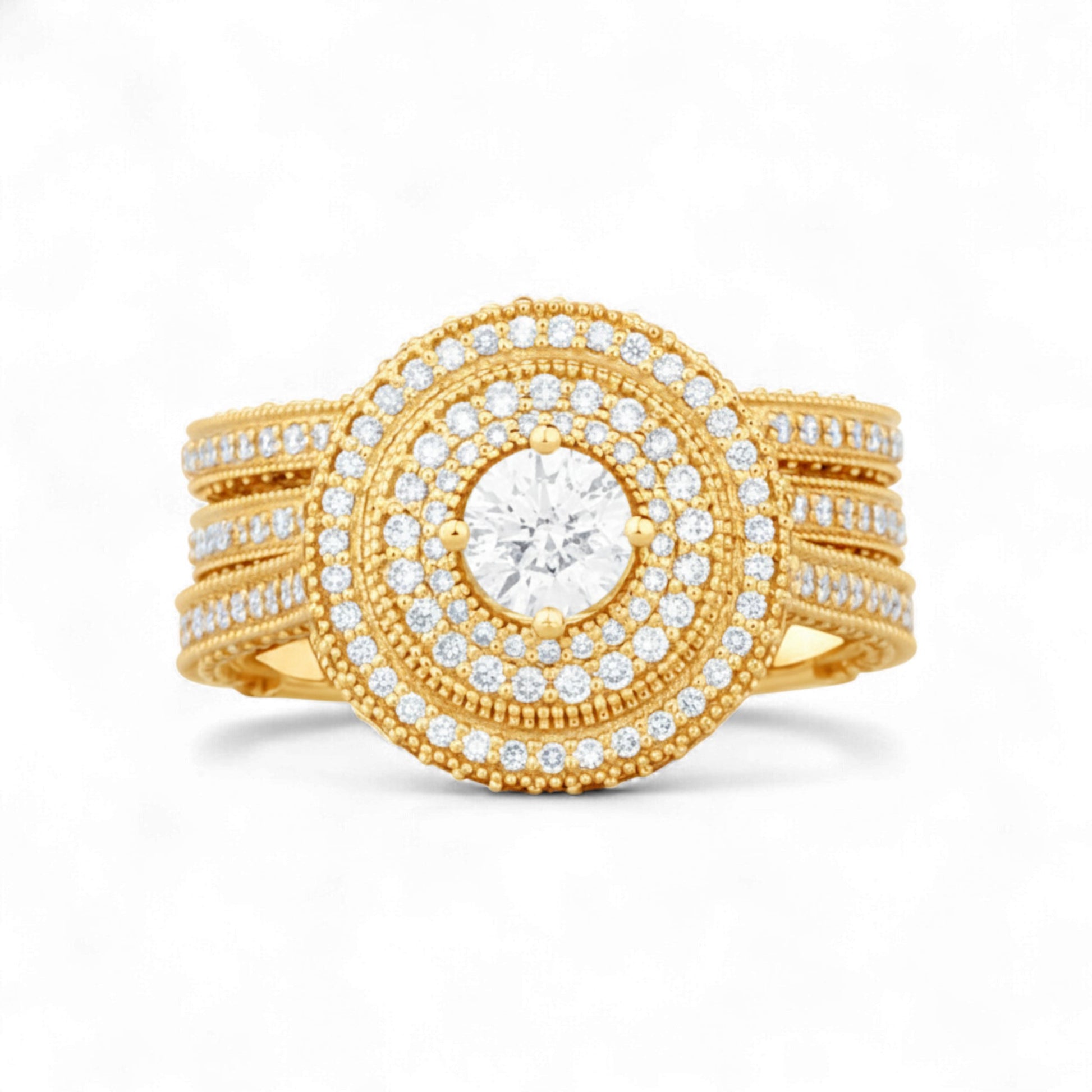 Gold ring with diamond accents on a white background