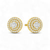 Gold and diamond earrings on a white background