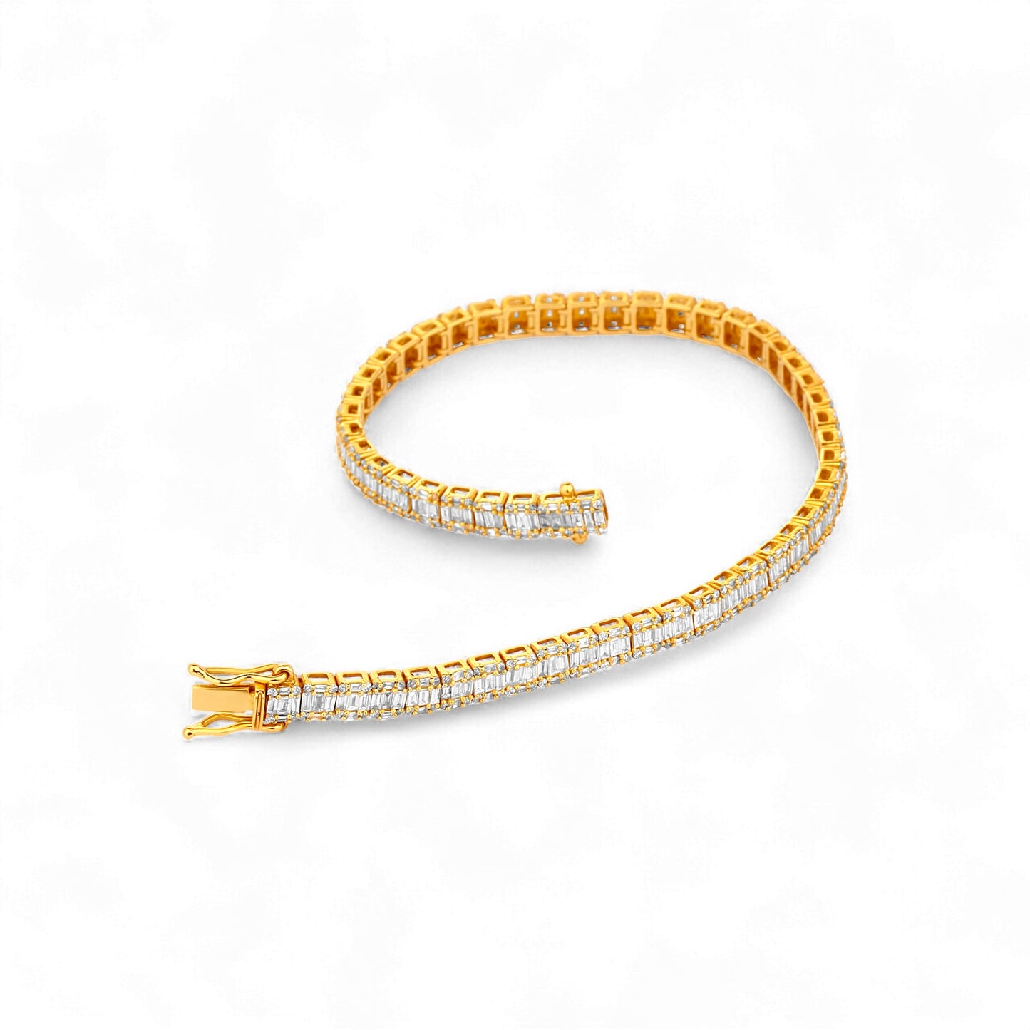 Gold bracelet with clear stones on a white background