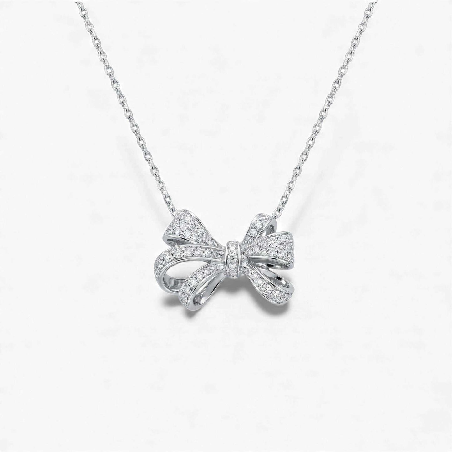Bow Tie Natural Diamond Necklace in 18KT gold with sparkling natural diamonds and elegant bow pendant