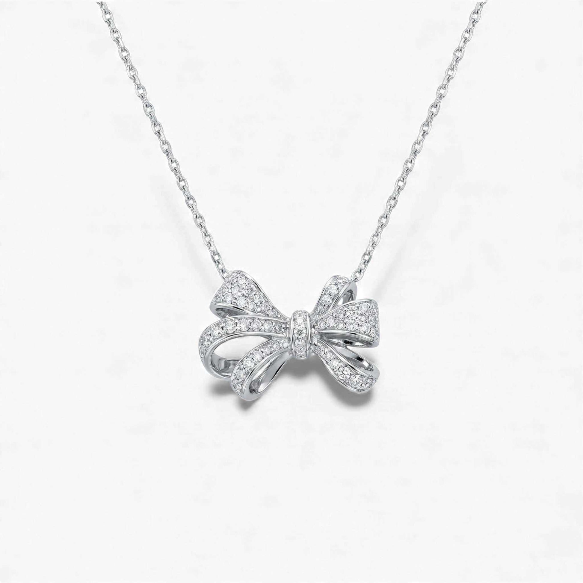 Bow Tie Natural Diamond Necklace in 18KT gold with sparkling natural diamonds and elegant bow pendant