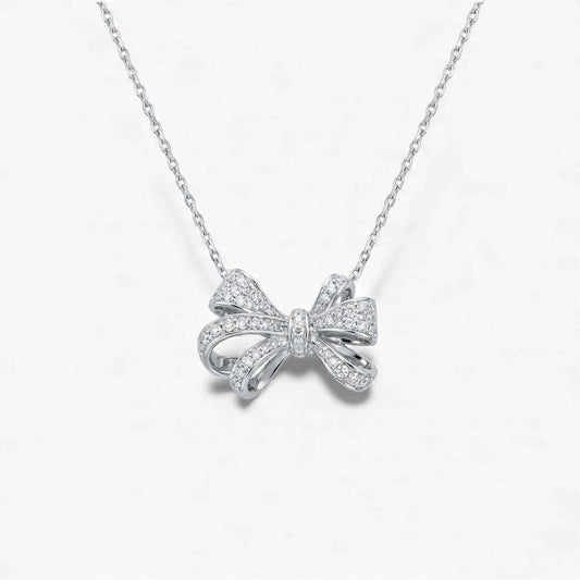 Bow Tie Natural Diamond Necklace in 18KT gold with sparkling natural diamonds and elegant bow pendant