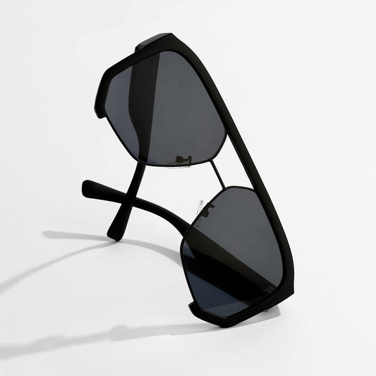 Black sunglasses with reflective lenses on a white background