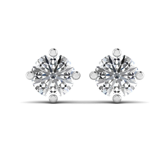 Pair of diamond stud earrings on a white background