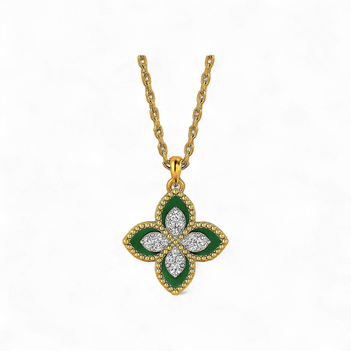 Gold necklace with a green and white floral pendant on a white background