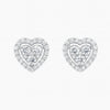 Heart-shaped earrings with clear gemstones on a white background