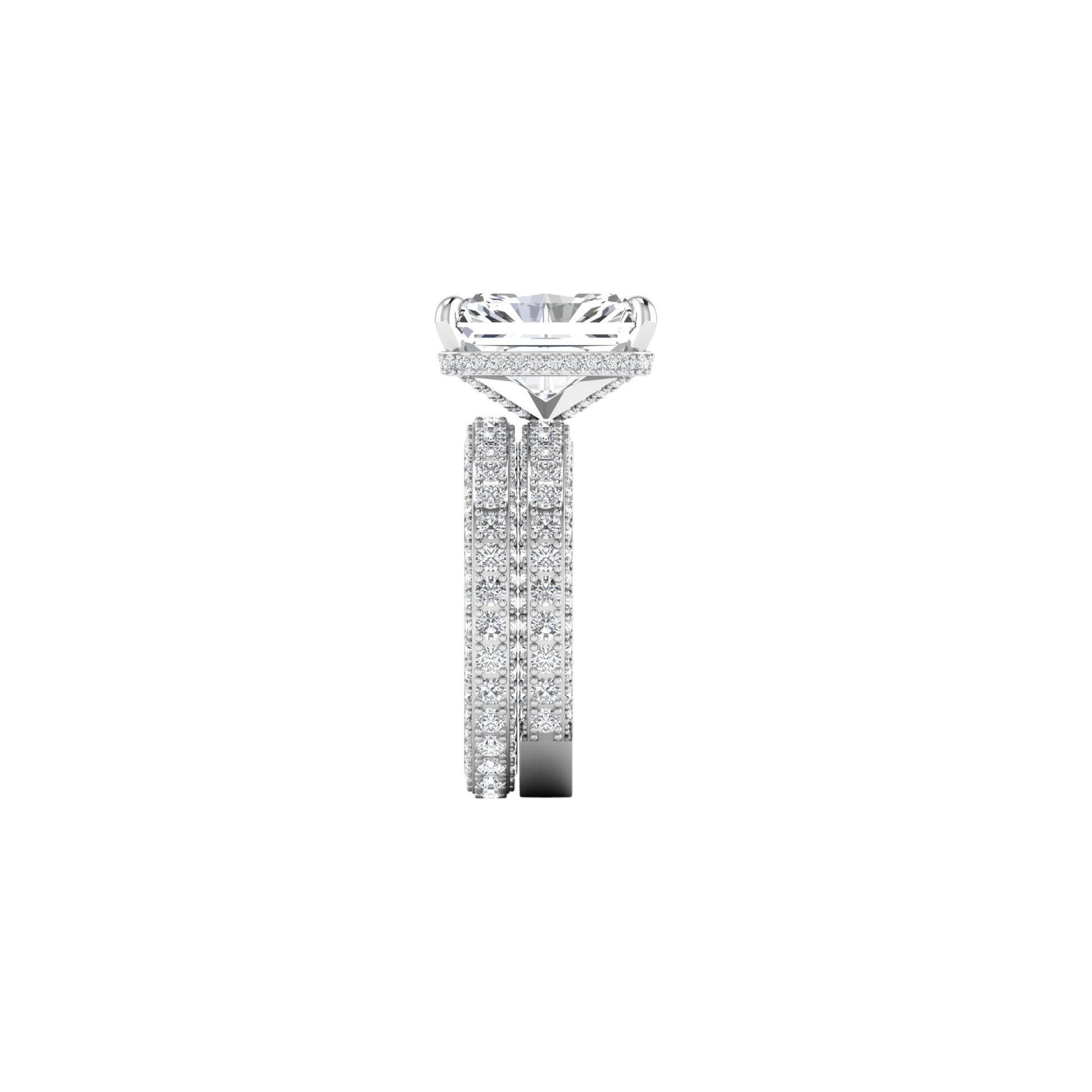 Diamond ring with a large central stone and smaller stones on the band against a white background