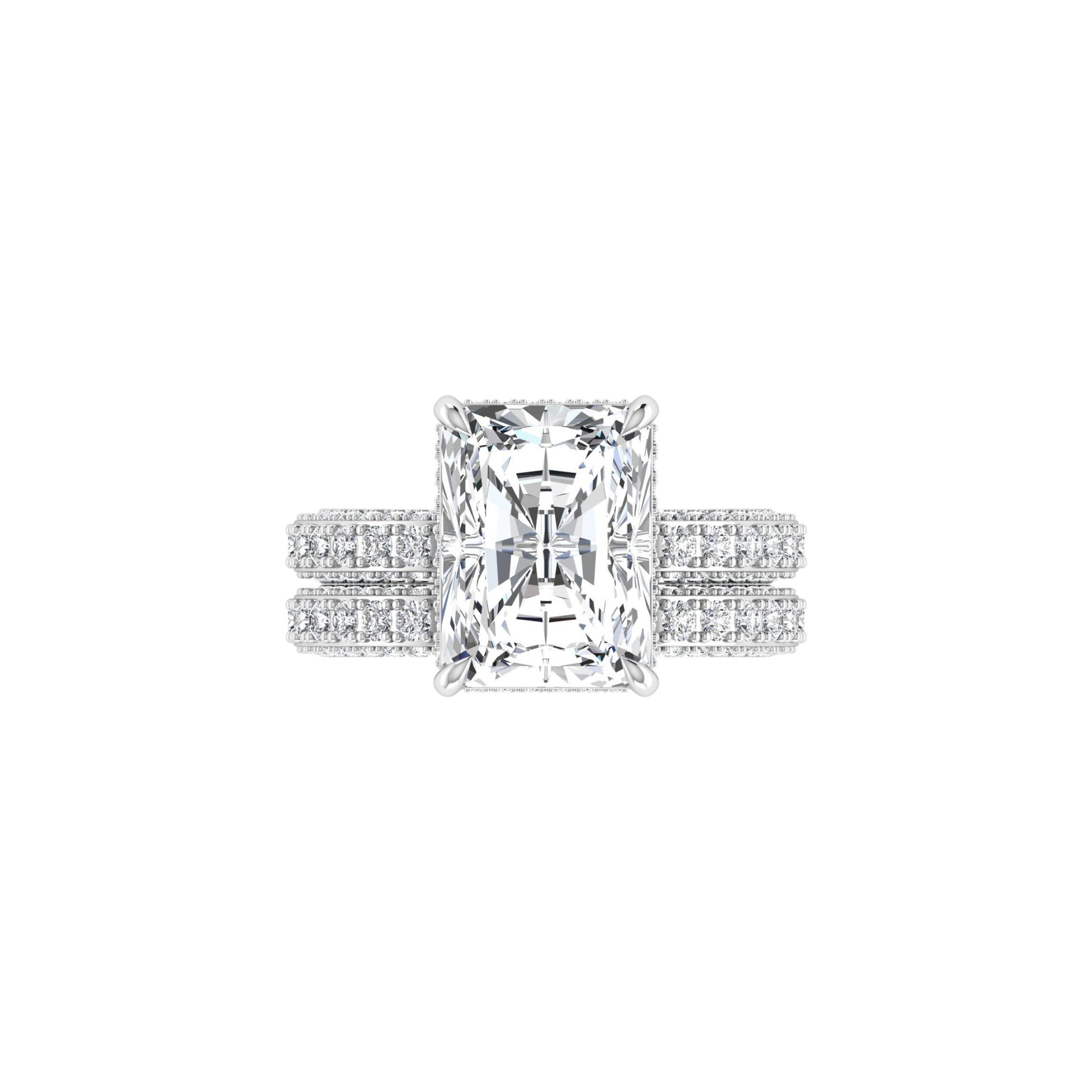 Diamond ring with a rectangular cut gemstone on a white background