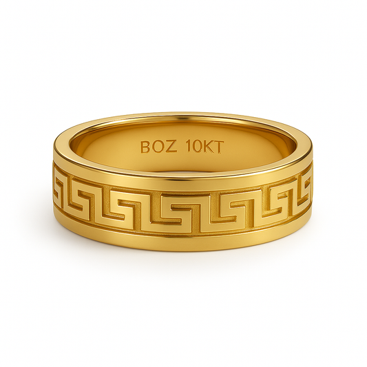 Gold ring with Greek key design and 'BOZ 10KT' engraving on a white background