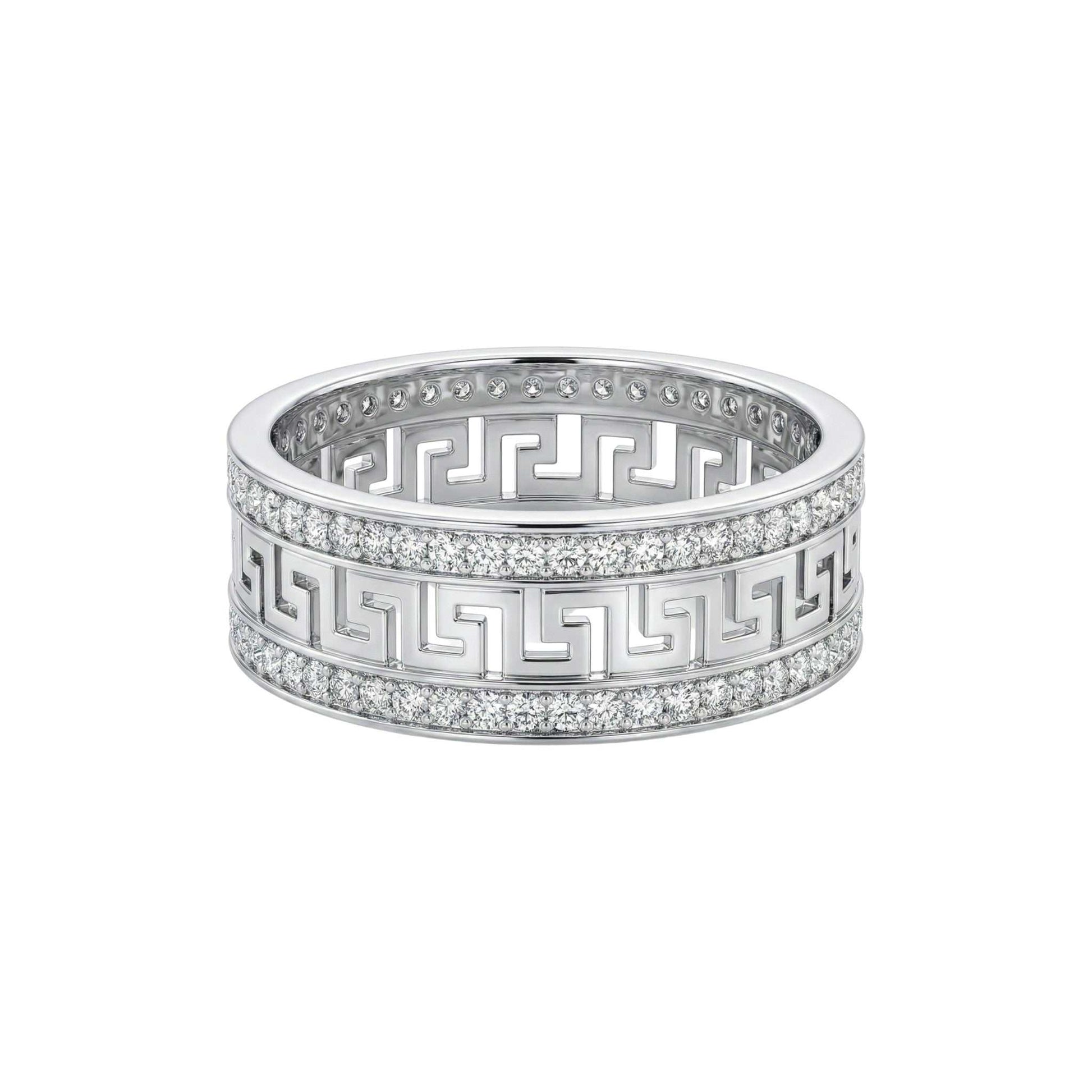Silver ring with geometric design on a white background