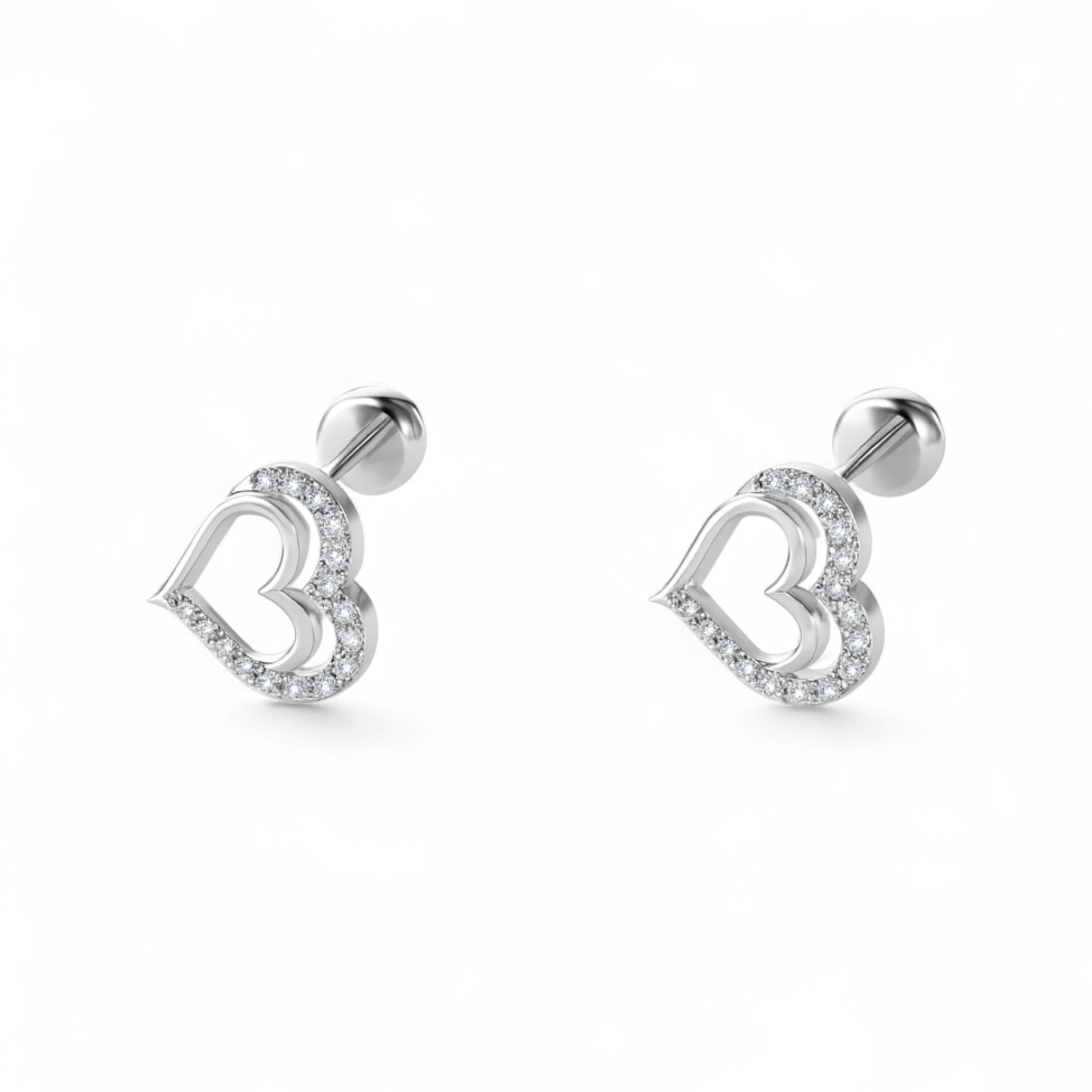 Heart-shaped silver earrings on a white background