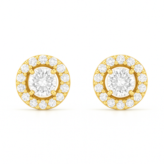 Gold earrings with clear gemstones on a white background