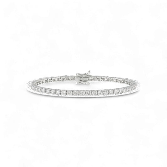 Silver bracelet with small diamonds on a white background