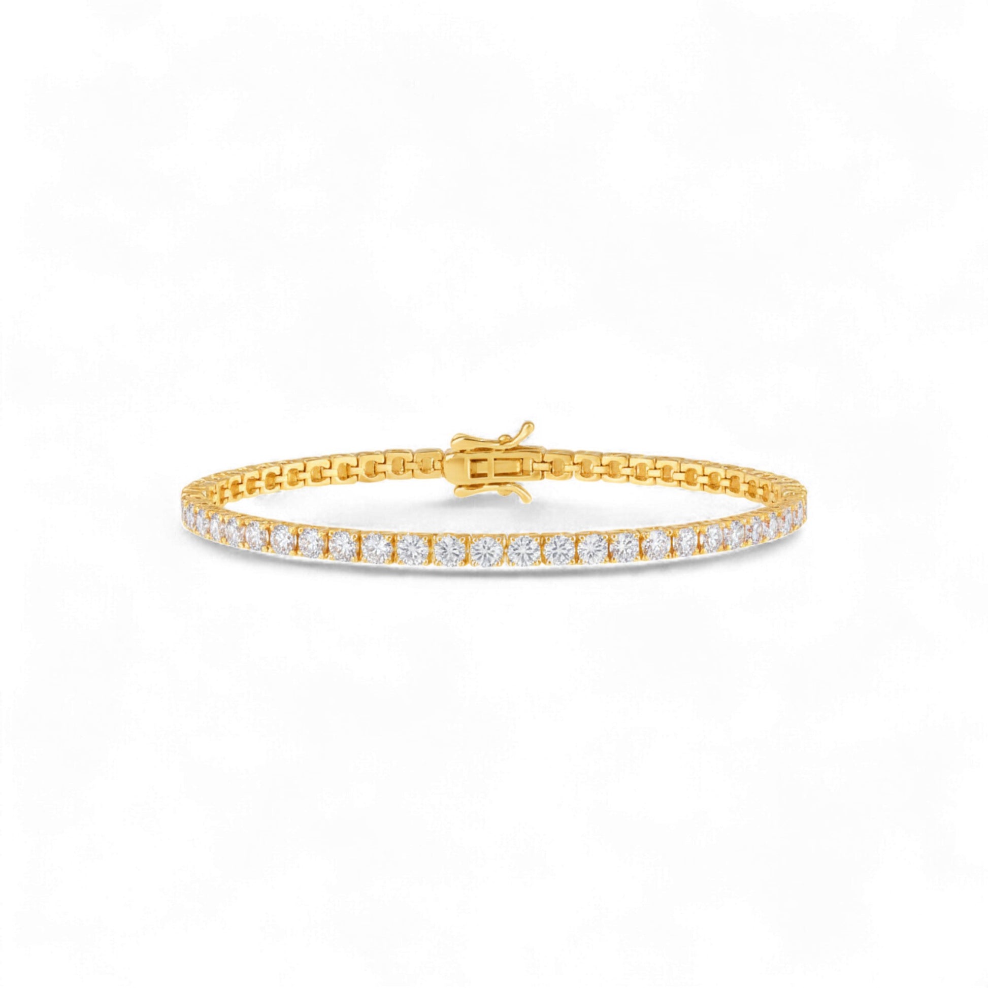 Gold bracelet with diamond accents on a white background