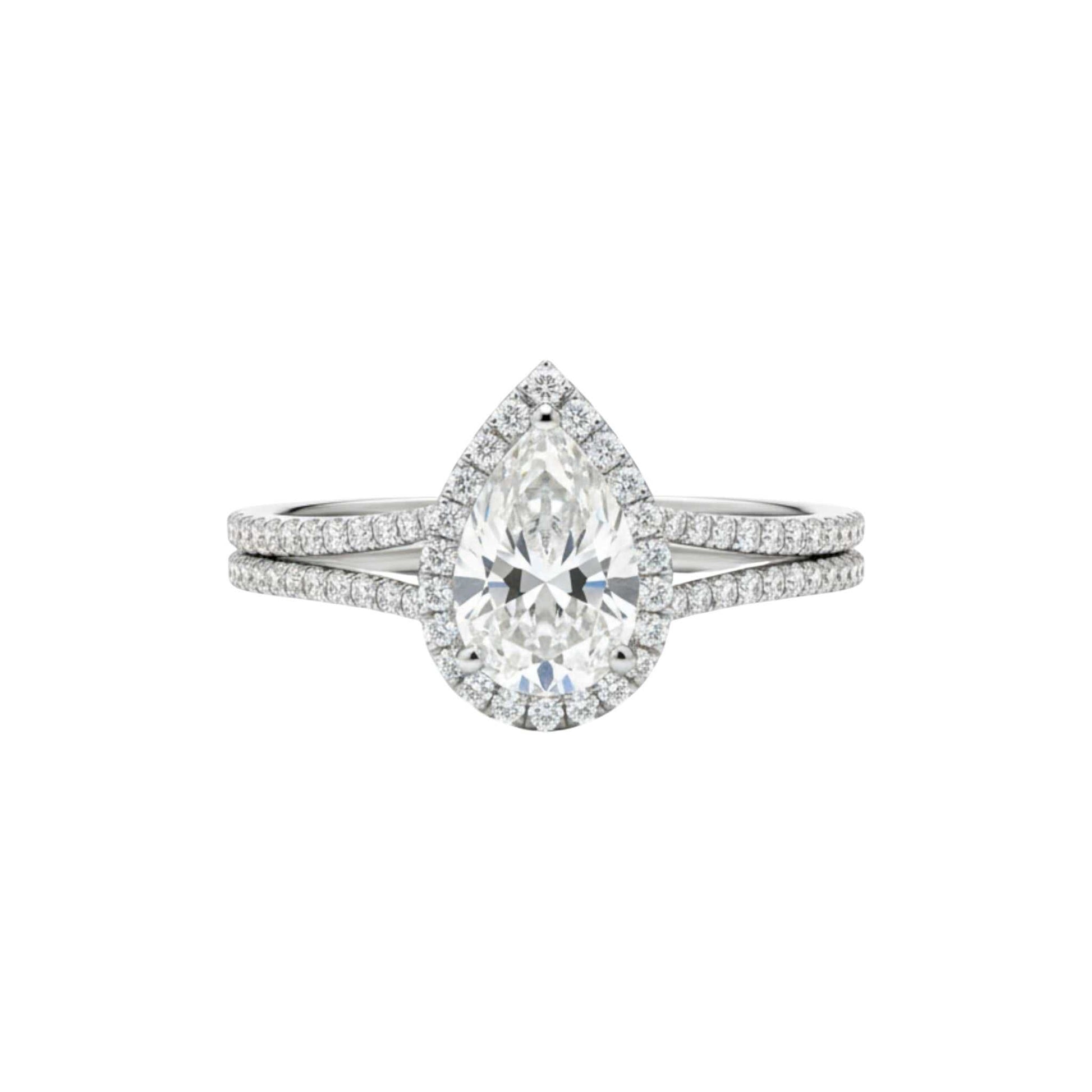 Leona Pear Cut Moissanite engagement ring in 18KT gold with pavé accents and split shank band