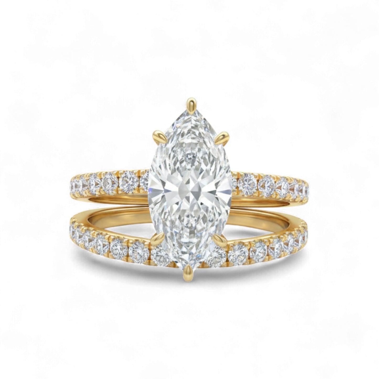 Gold ring with a pear-shaped diamond and smaller diamonds on a white background