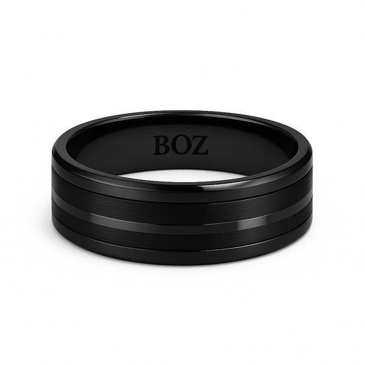 Black ring with 'BOZ' engraving on a white background