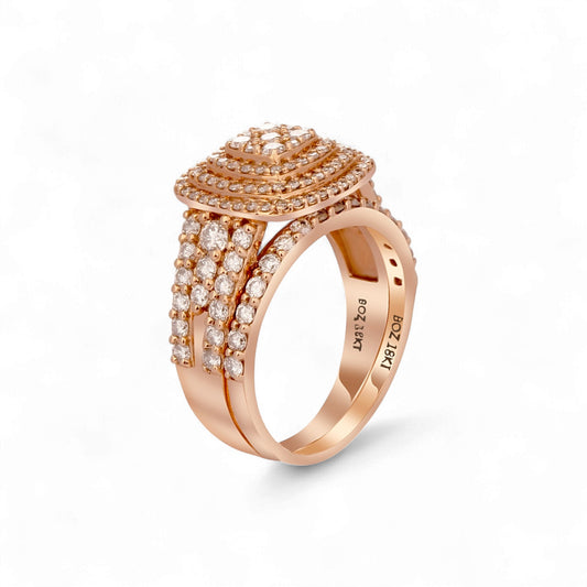 Rose gold ring with diamond accents on a white background