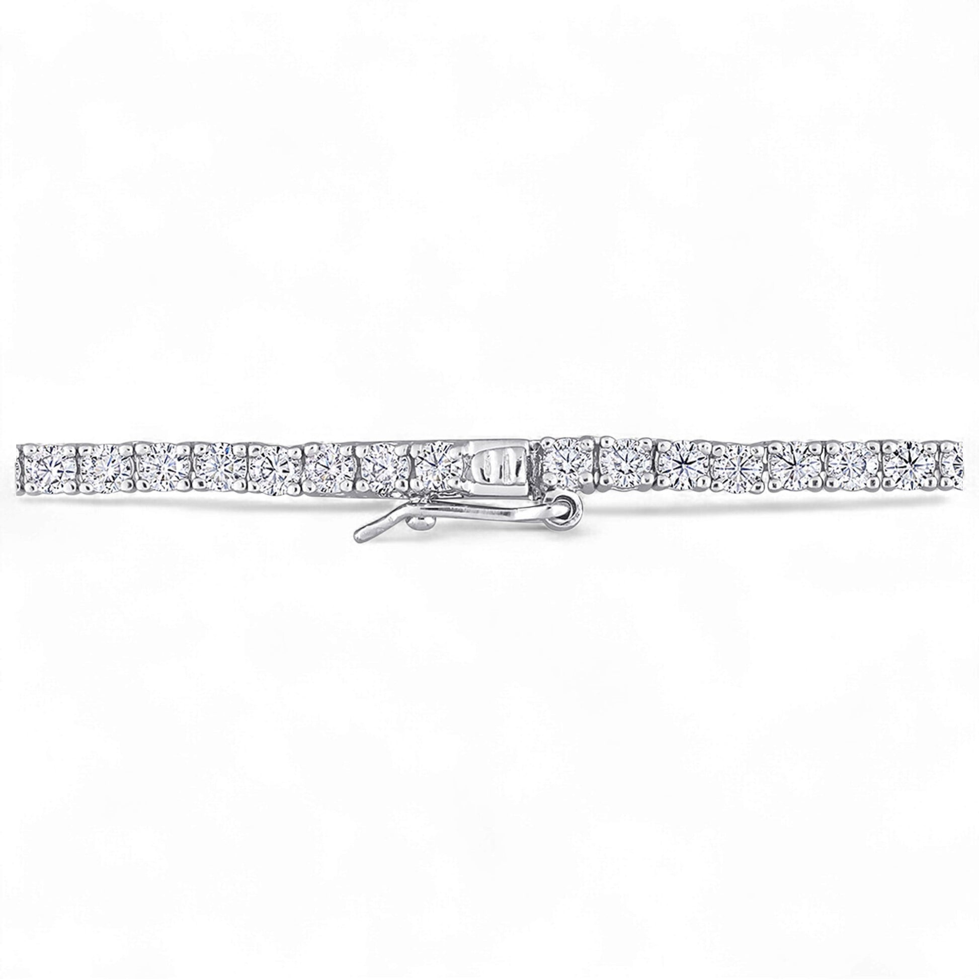Diamond bar brooch on a white background