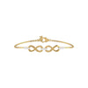 Gold bracelet with infinity symbol and small diamonds on a white background