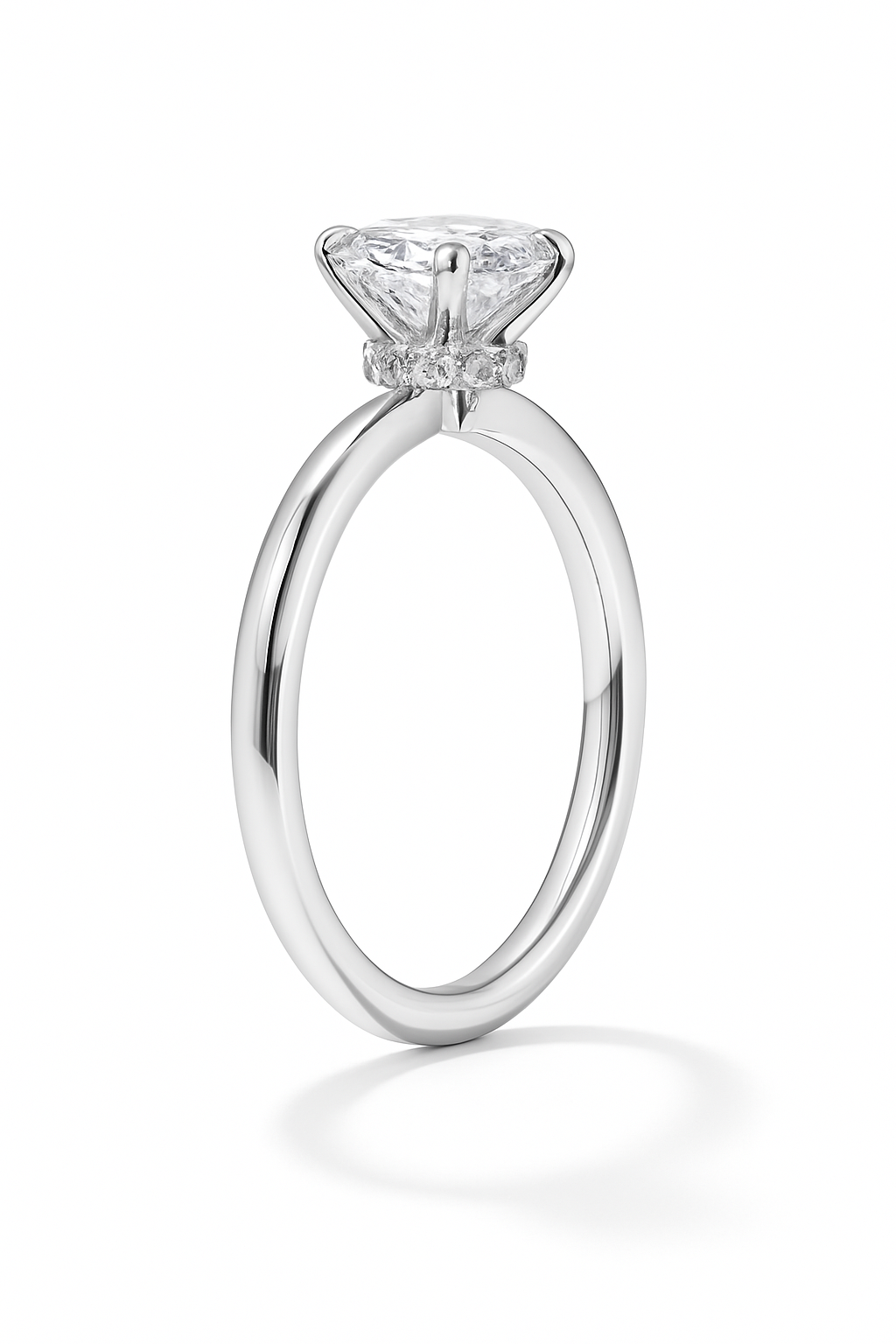 Silver ring with a diamond on a white background