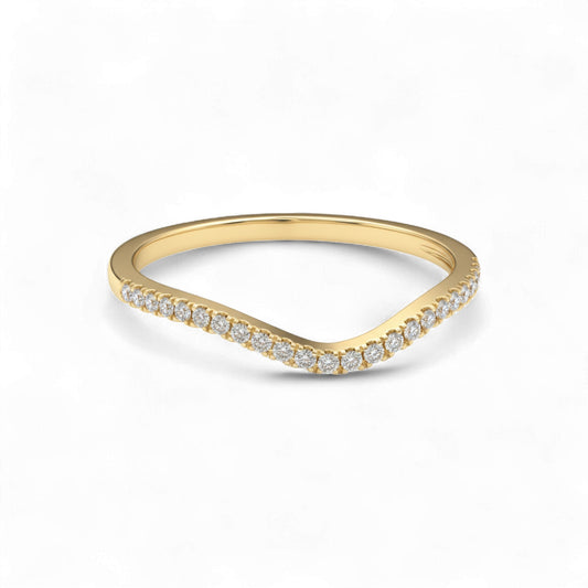 Gold ring with small diamonds on a white background