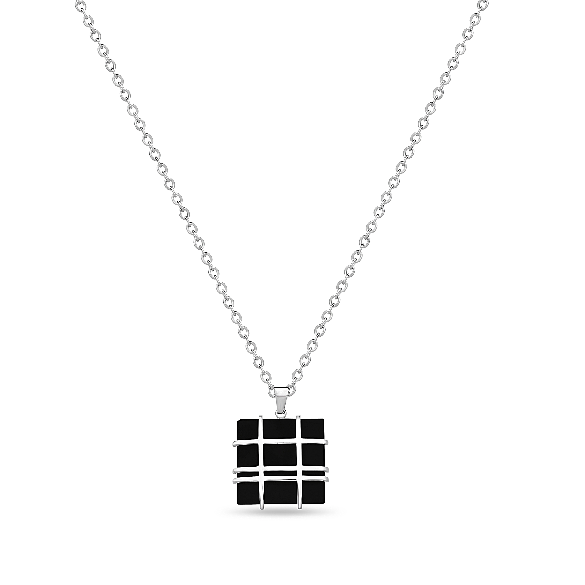 A hypoallergenic steel necklace with a geometric black and silver cube pendant.