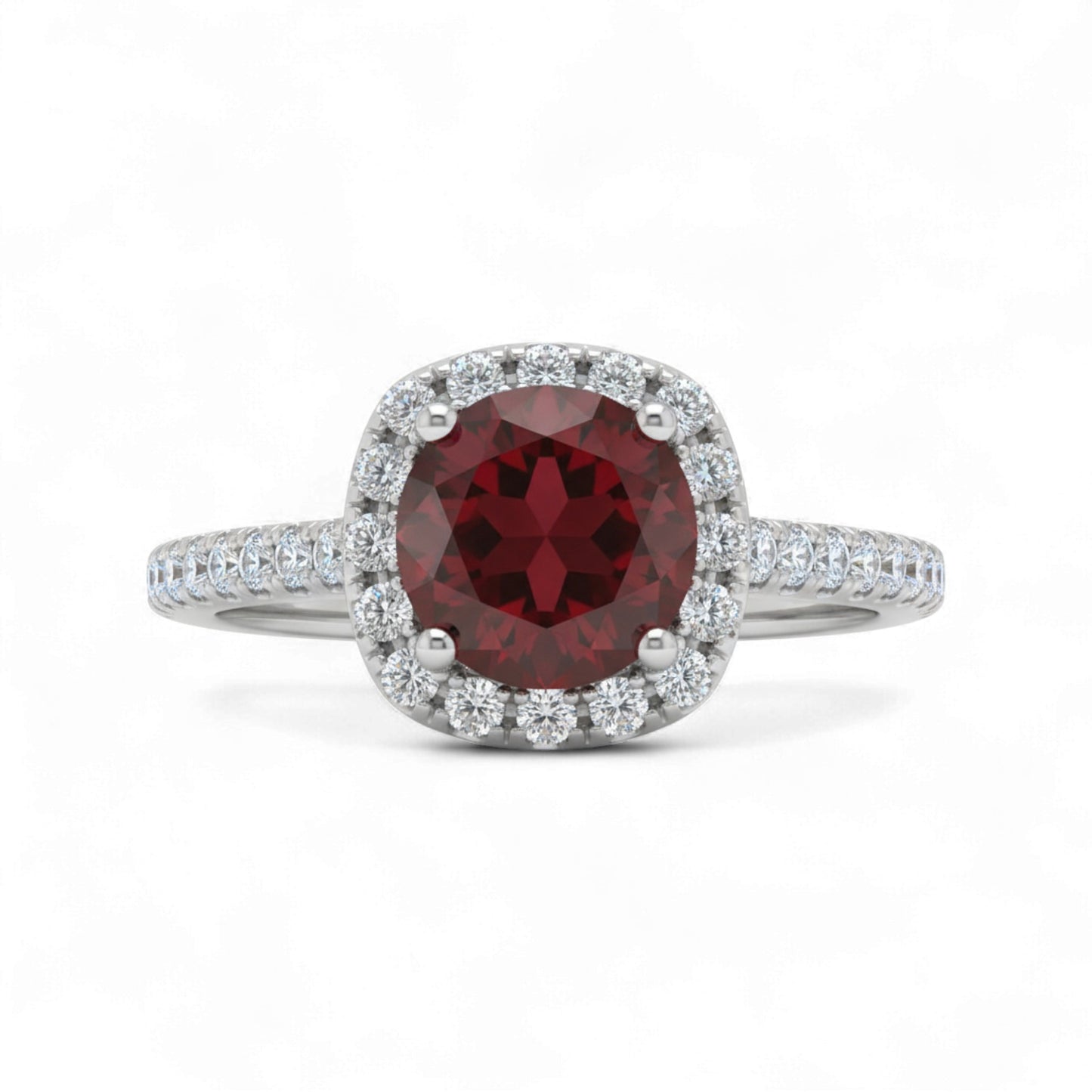 Ring with a red gemstone and diamond accents on a white background