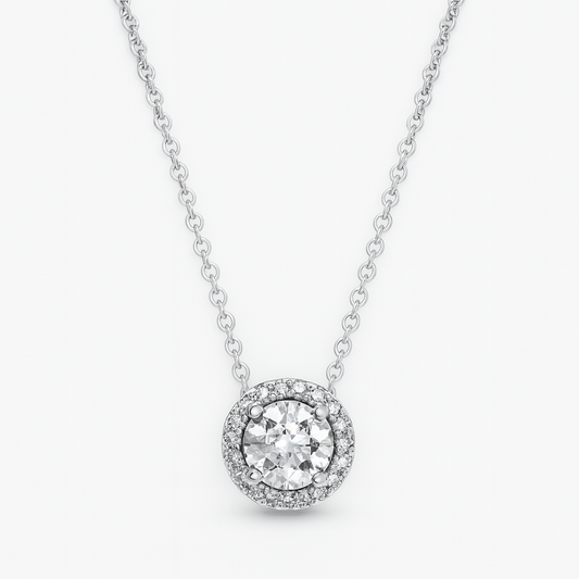 Silver necklace with a round diamond pendant on a white background