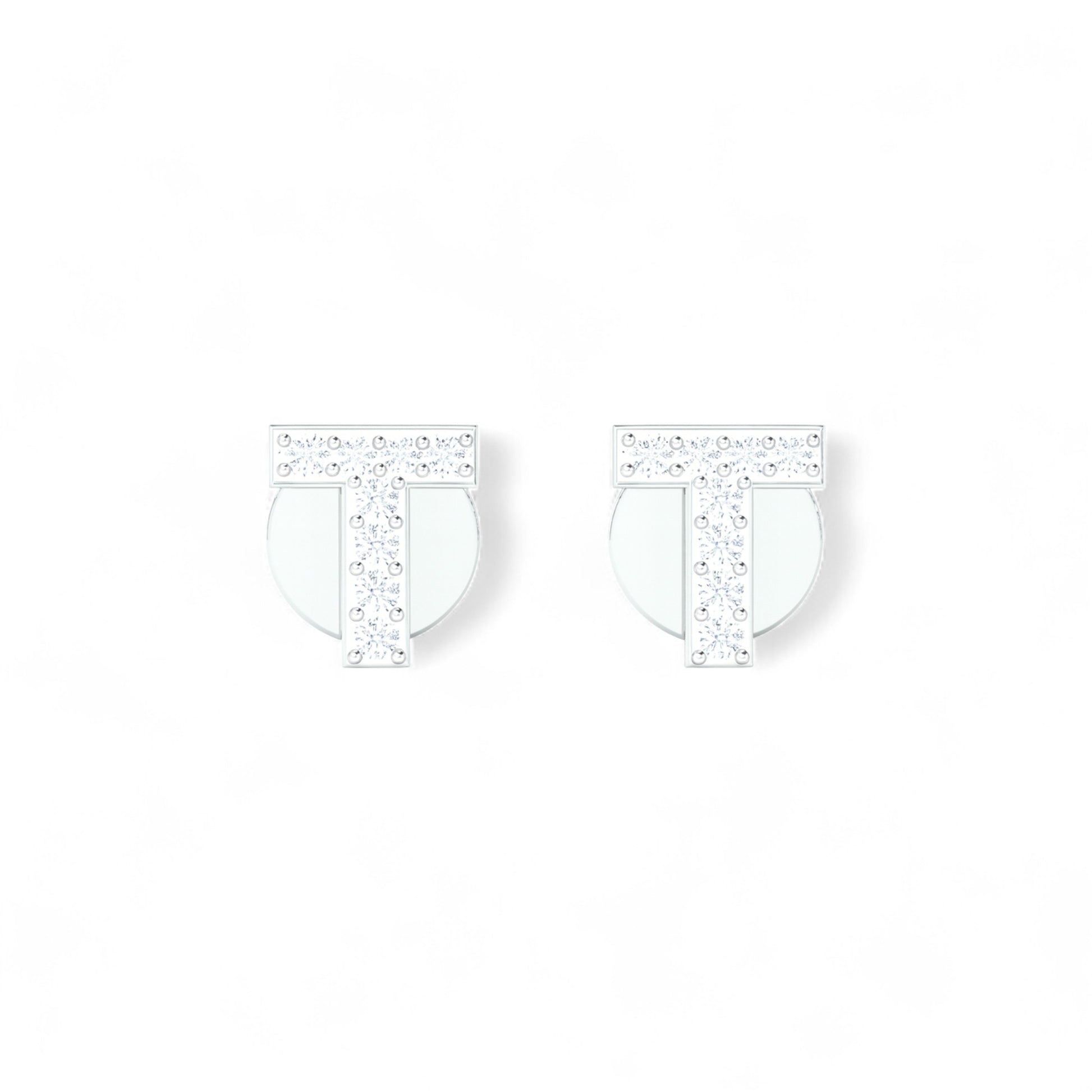 Pair of silver earrings with clear gemstones on a white background