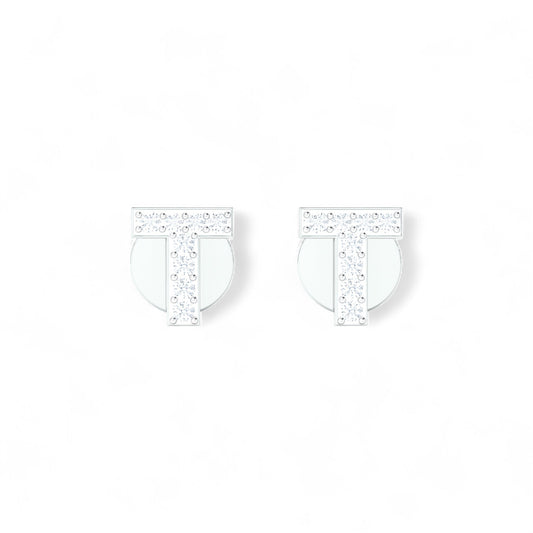 Pair of silver earrings with clear gemstones on a white background