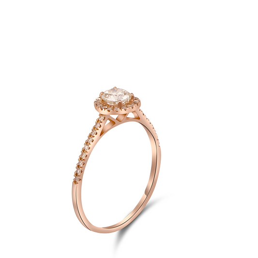 Rose gold ring with a diamond on a white background